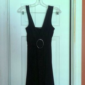 Sundress with embellishment on front.